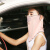 車で〓面の紗の日焼け止めマスクをして、首の女性をかばいます。夏の紫外線を防ぎます。